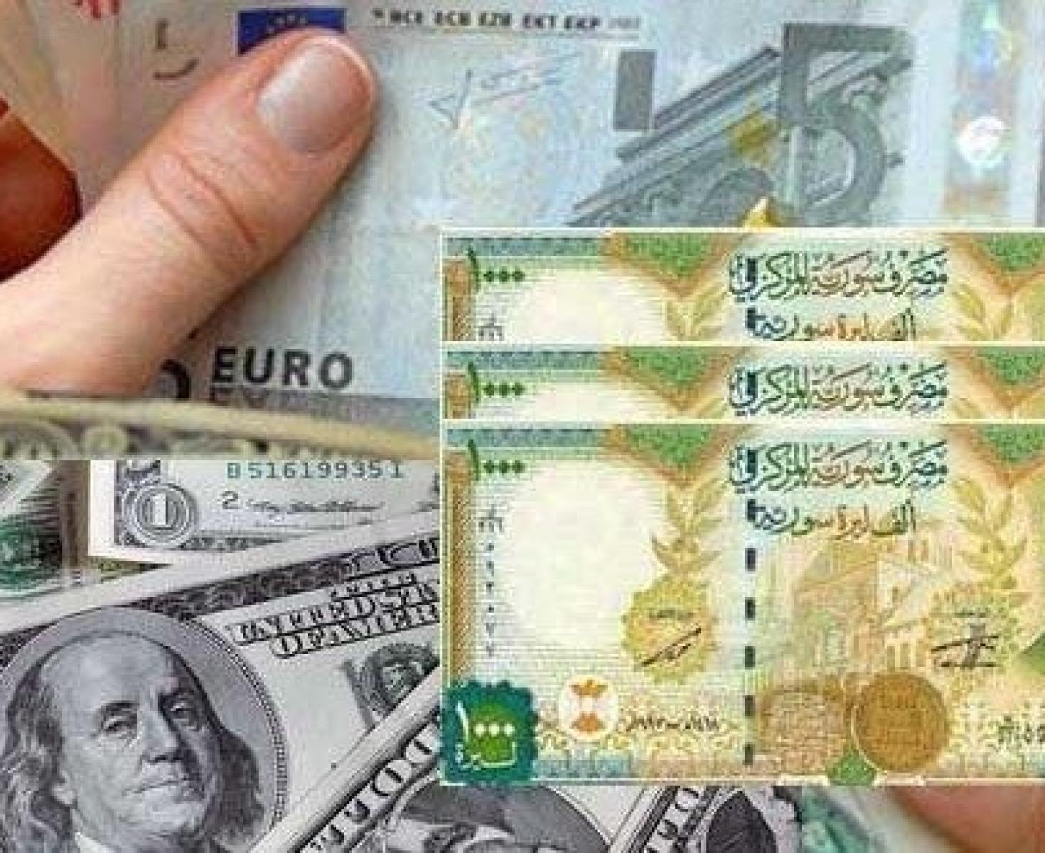 الليرة السورية والدولار.jpeg