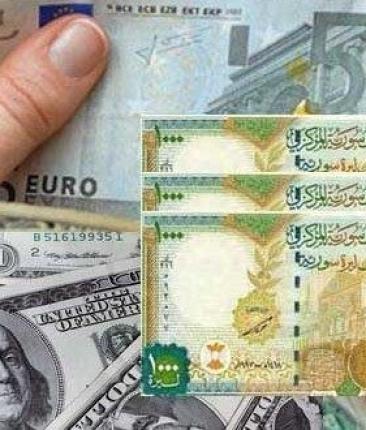 الليرة السورية والدولار.jpeg