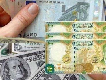 الليرة السورية والدولار.jpeg